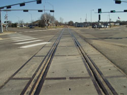 At grade crossings are improved with new signals, gates and crossing surfaces